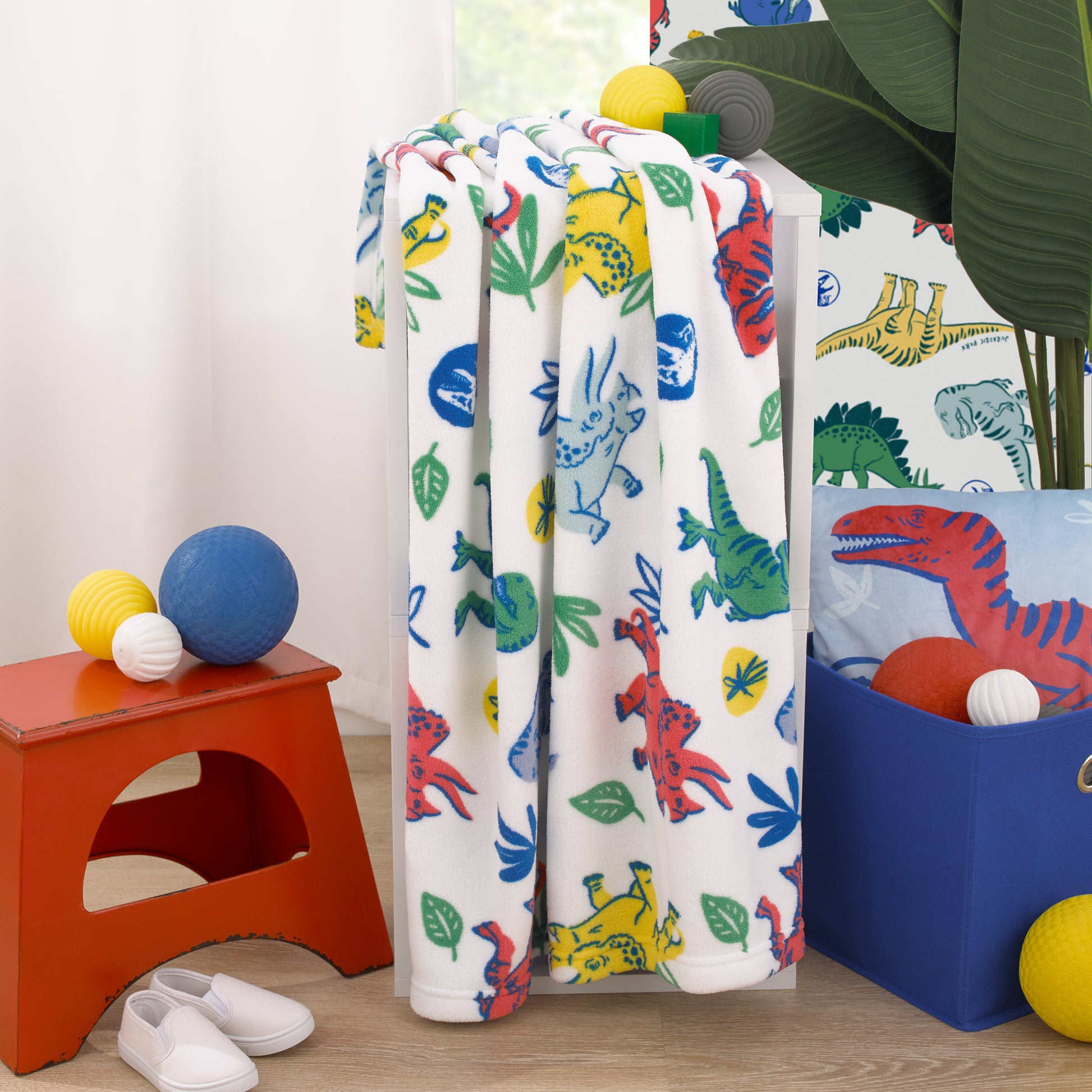 Universal Jurassic World Wild and Free Blue, Green, and Yellow Dinosaur Super Soft Plush Toddler Blanket