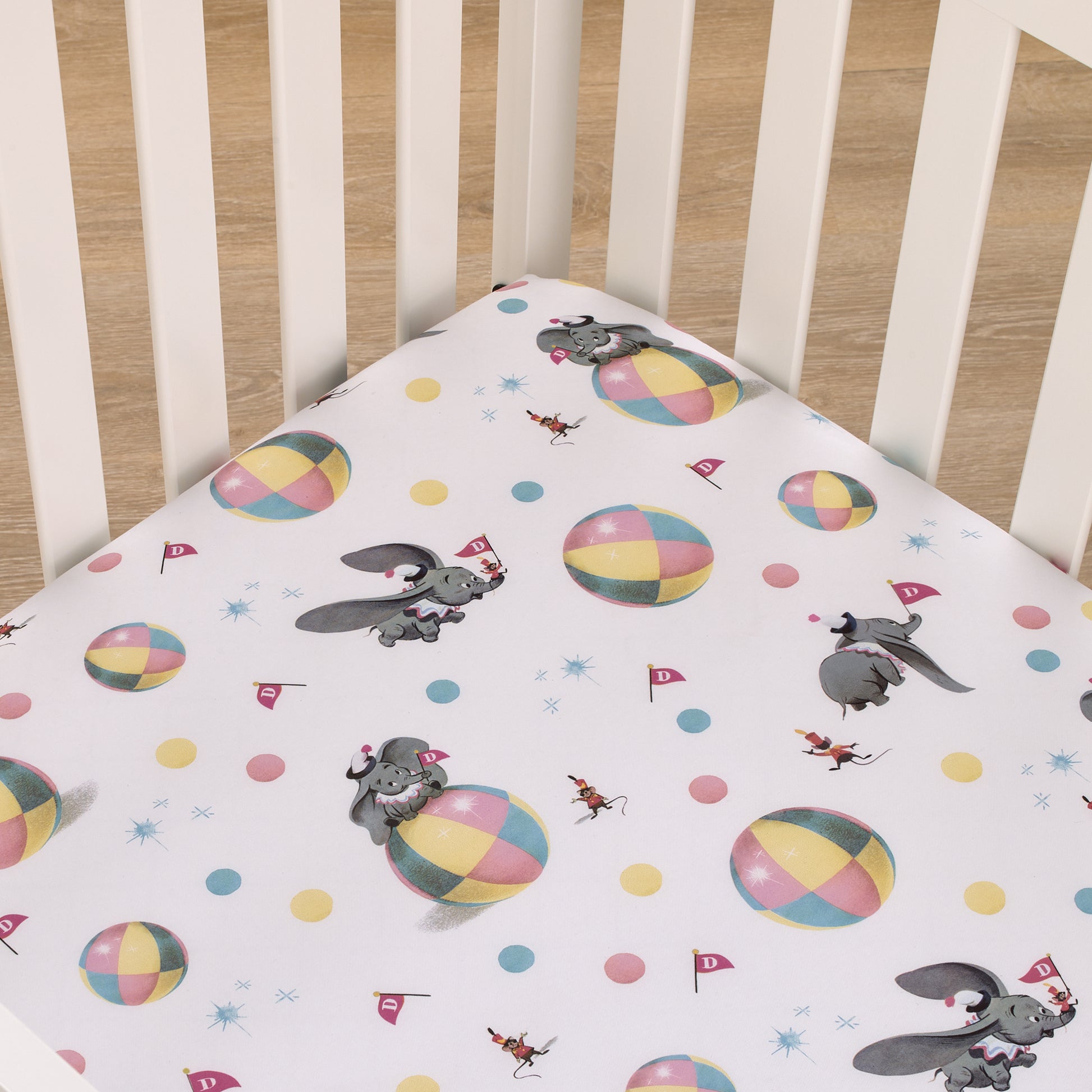 Disney Vintage Dumbo - Gray, White and Multi-Colored Circus Flags, Balls and Timothy Mouse Nursery Fitted Crib Sheet