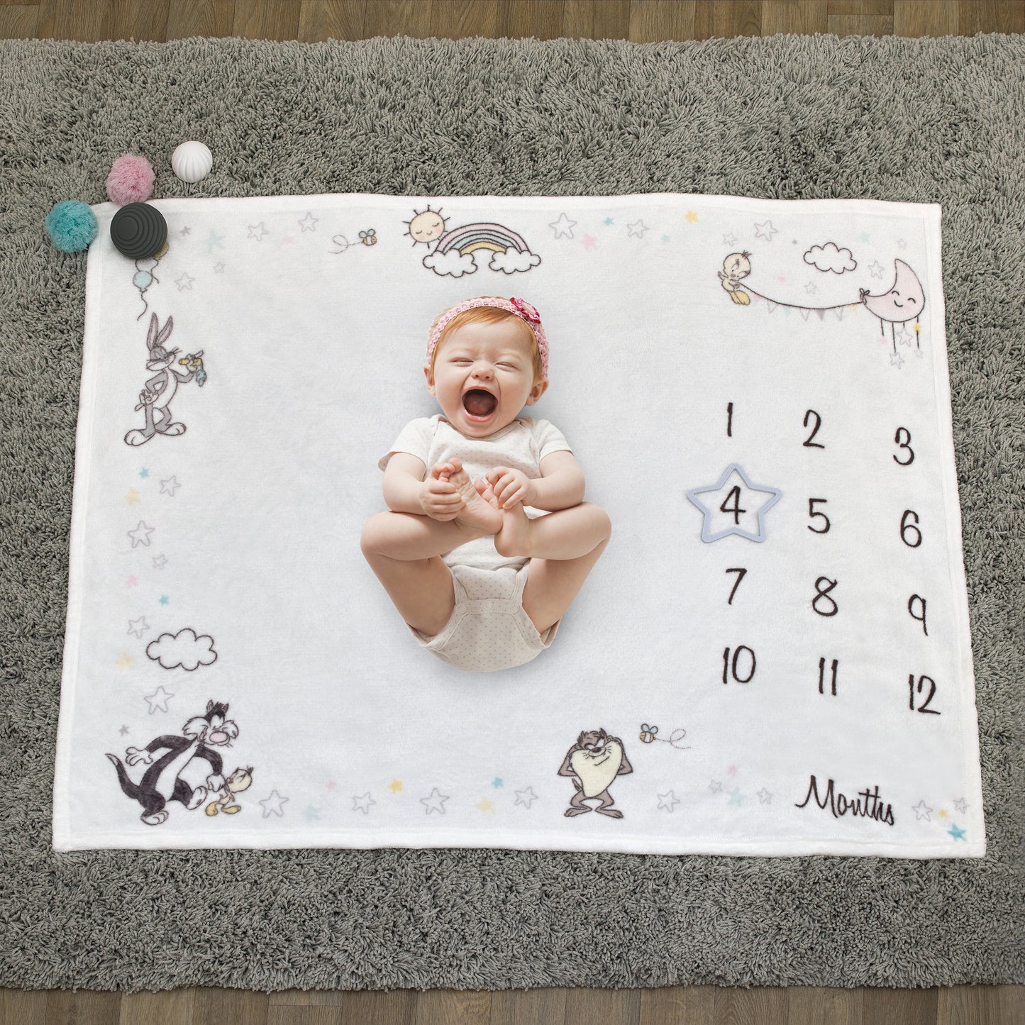 Warner Brothers Looney Tunes Best Buds White with Pastel Blue, Pink, and Yellow Bugs Bunny, Tweety, Tasmanian Devil, and Sylvester the Cat Milestone Blanket