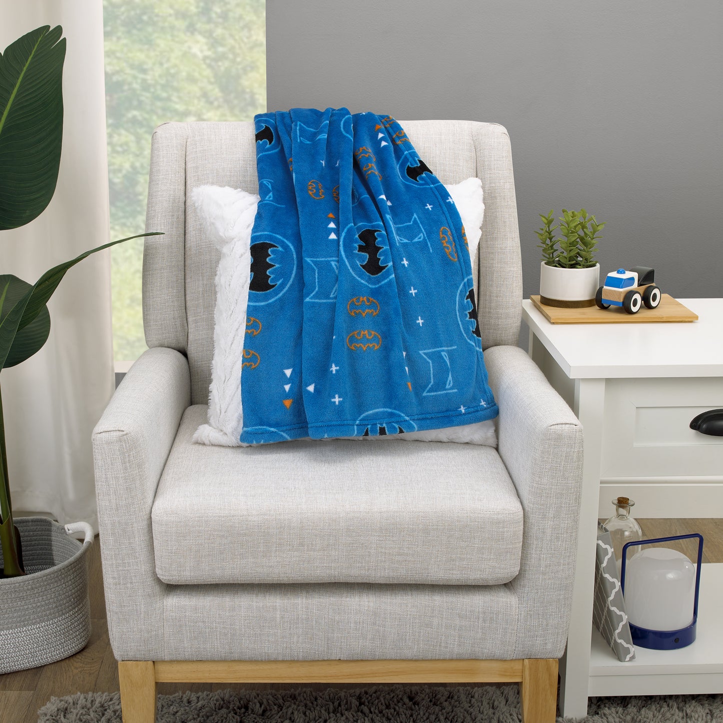 Warner Brothers Batman Blue, Orange, and White with Icons, Emblems, and Triangles Super Soft Baby Blanket