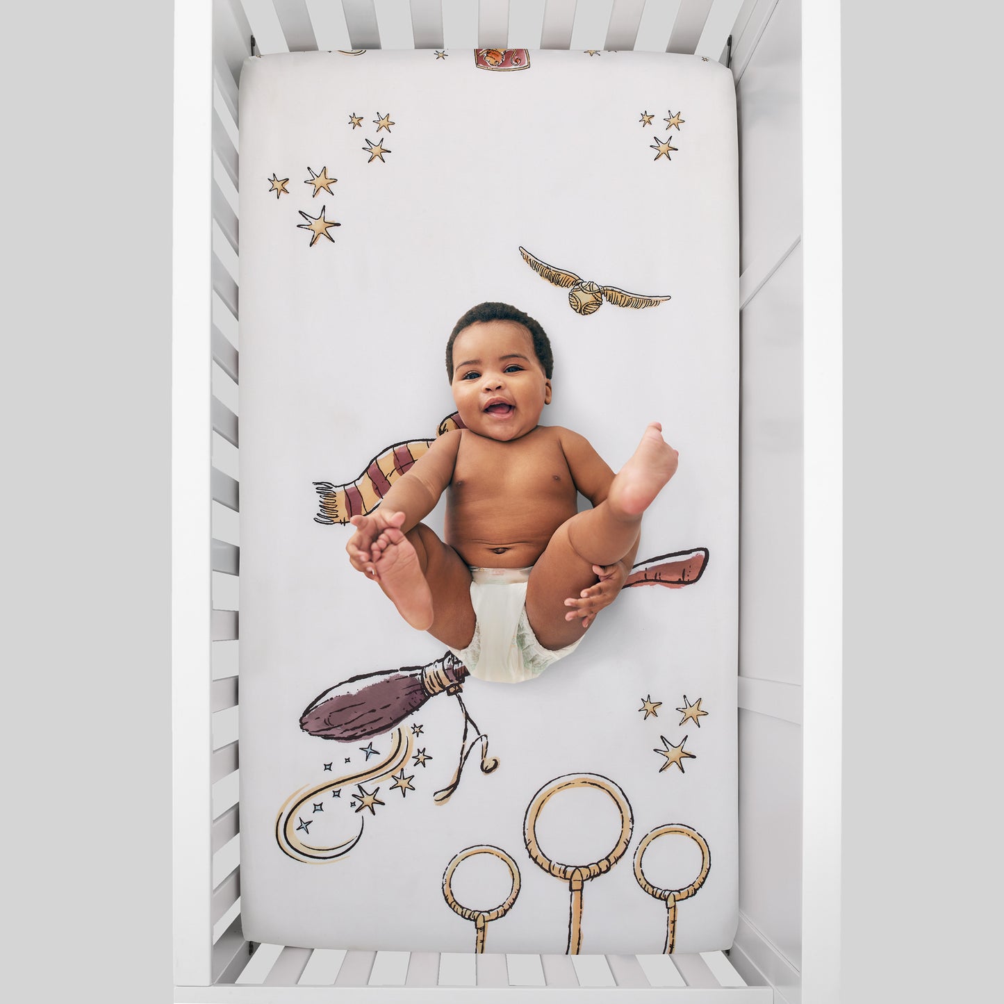 Warner Brothers Harry Potter Magical Moments White and Gold Photo Op Fitted Crib Sheet