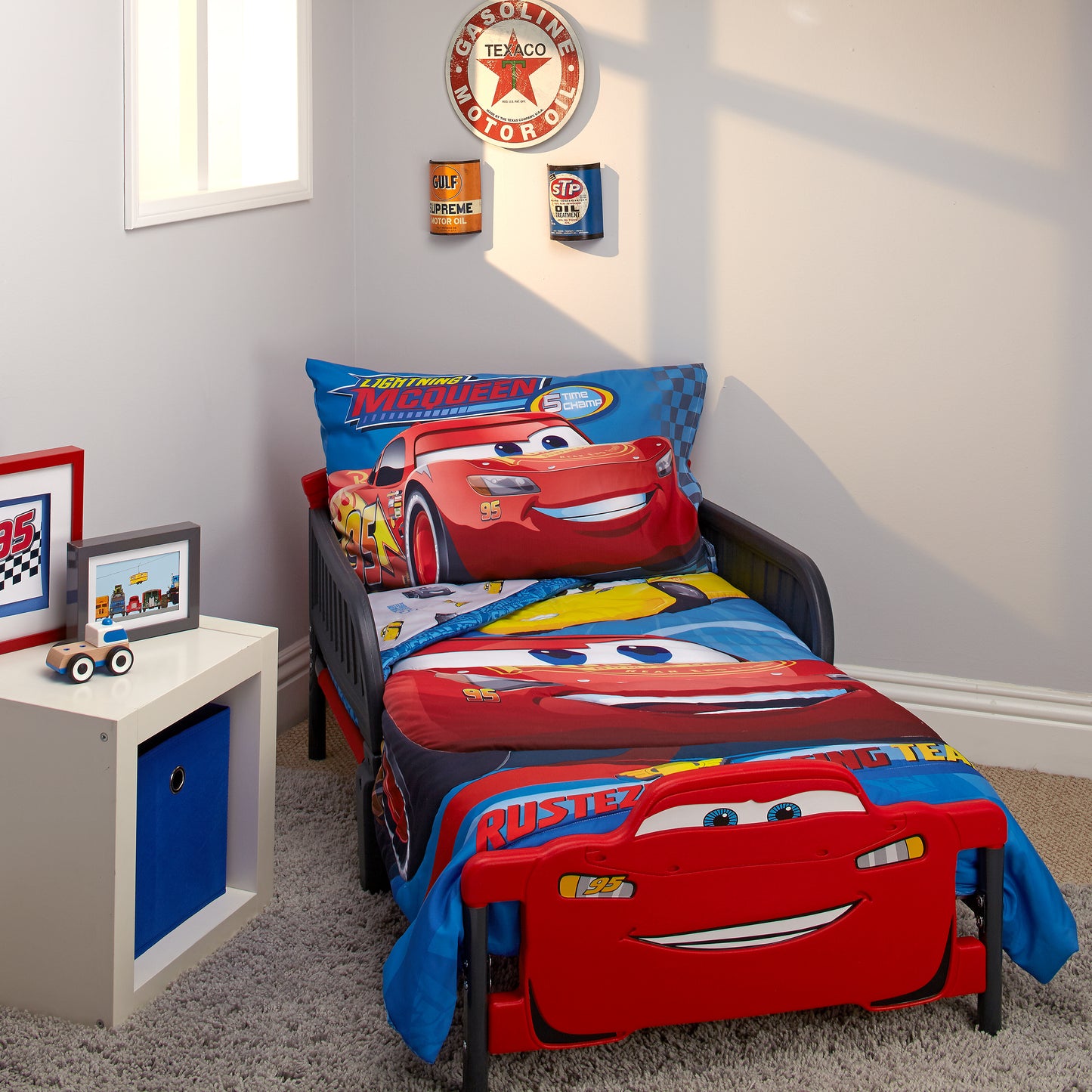 Disney Cars Rusteze Racing Team Blue, Red , and Yellow Amigo Cruz Ramirez and Jackson Storm 4 Piece Toddler Bed Set - Comforter, Fitted Bottom Sheet, Flat Top Sheet, and Reversible Pillowcase